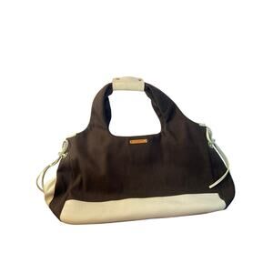 Kate Spade New York , brown and white handbag.